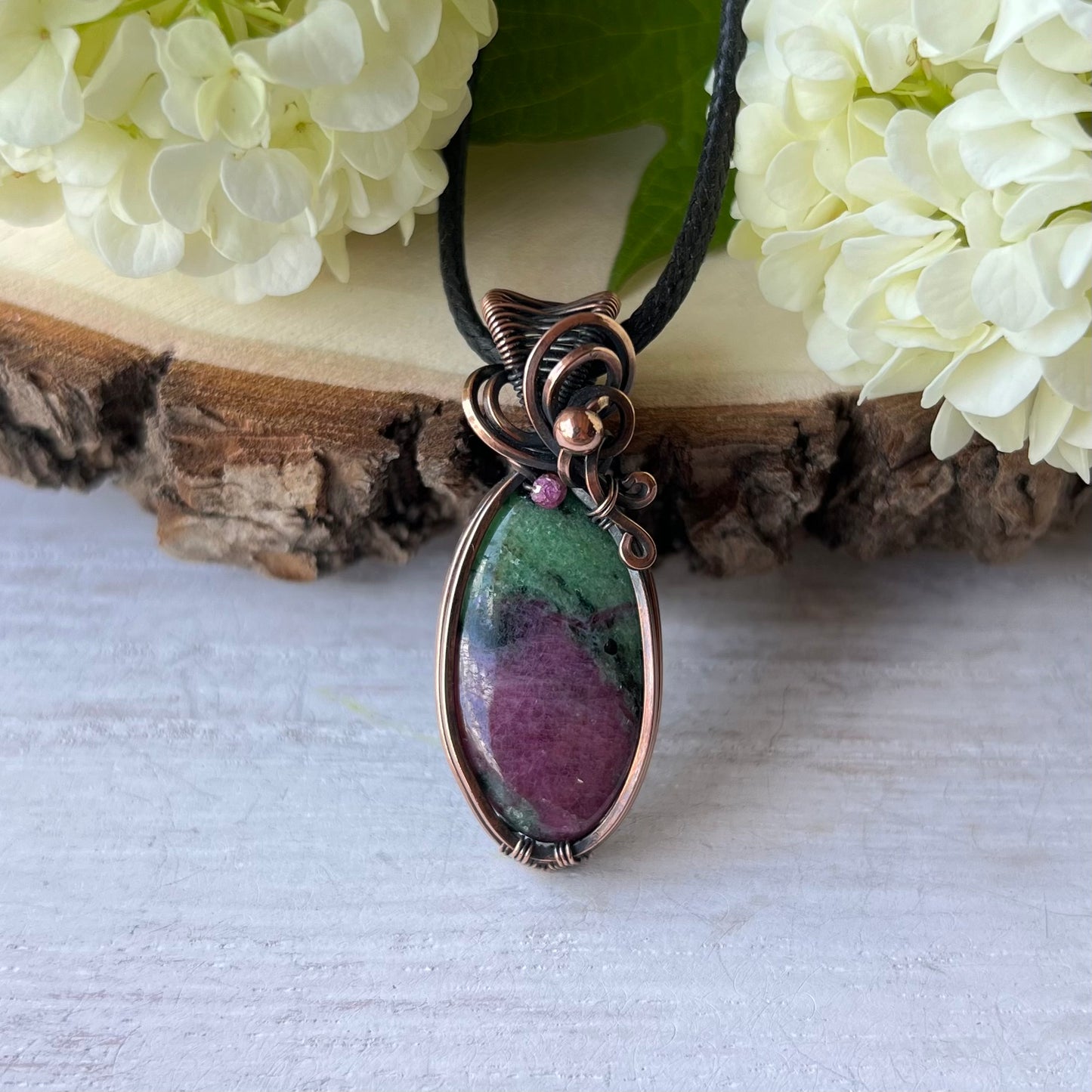 Ruby Zoisite with Ruby bead in antiqued Copper Wire