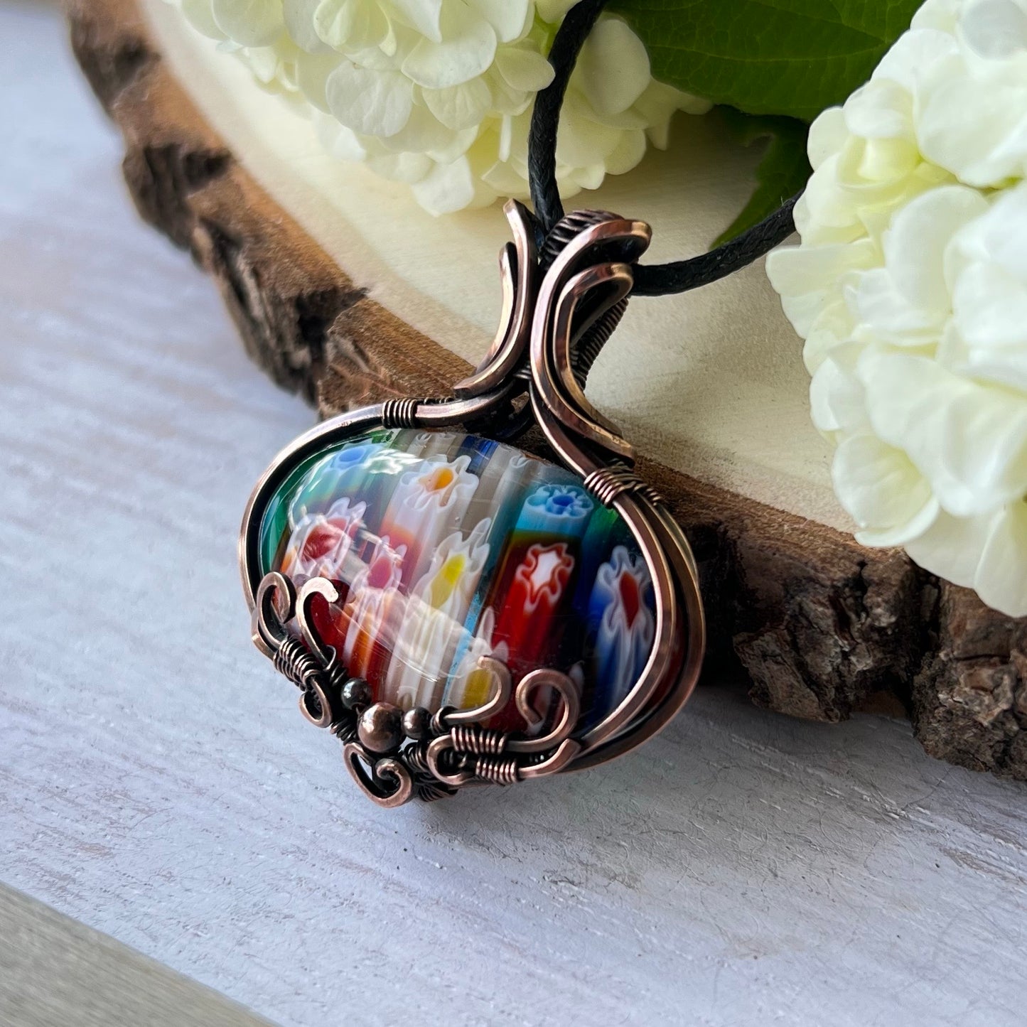 Millefiori Glass Pendant in antiqued Copper Wire