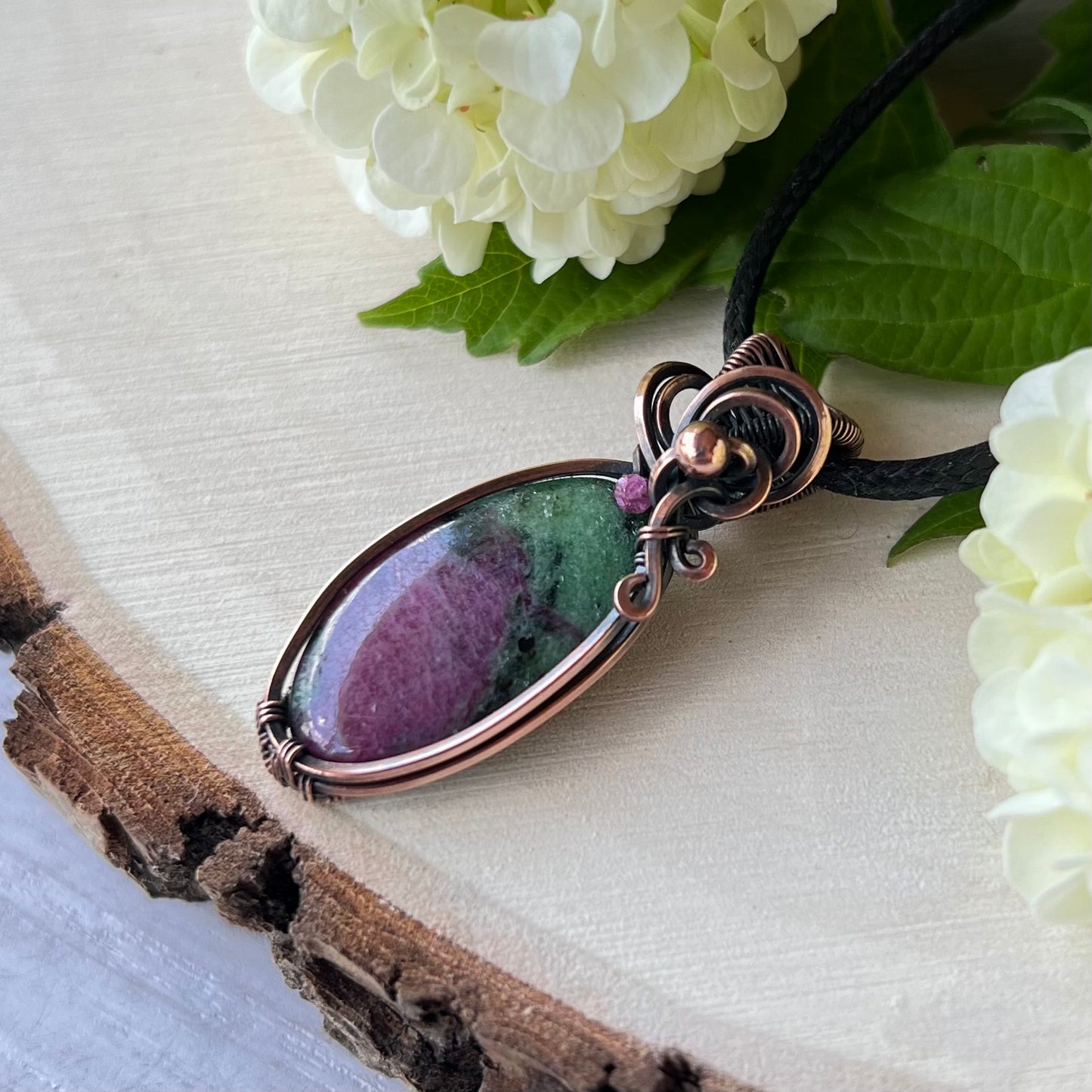 Ruby Zoisite with Ruby bead in antiqued Copper Wire