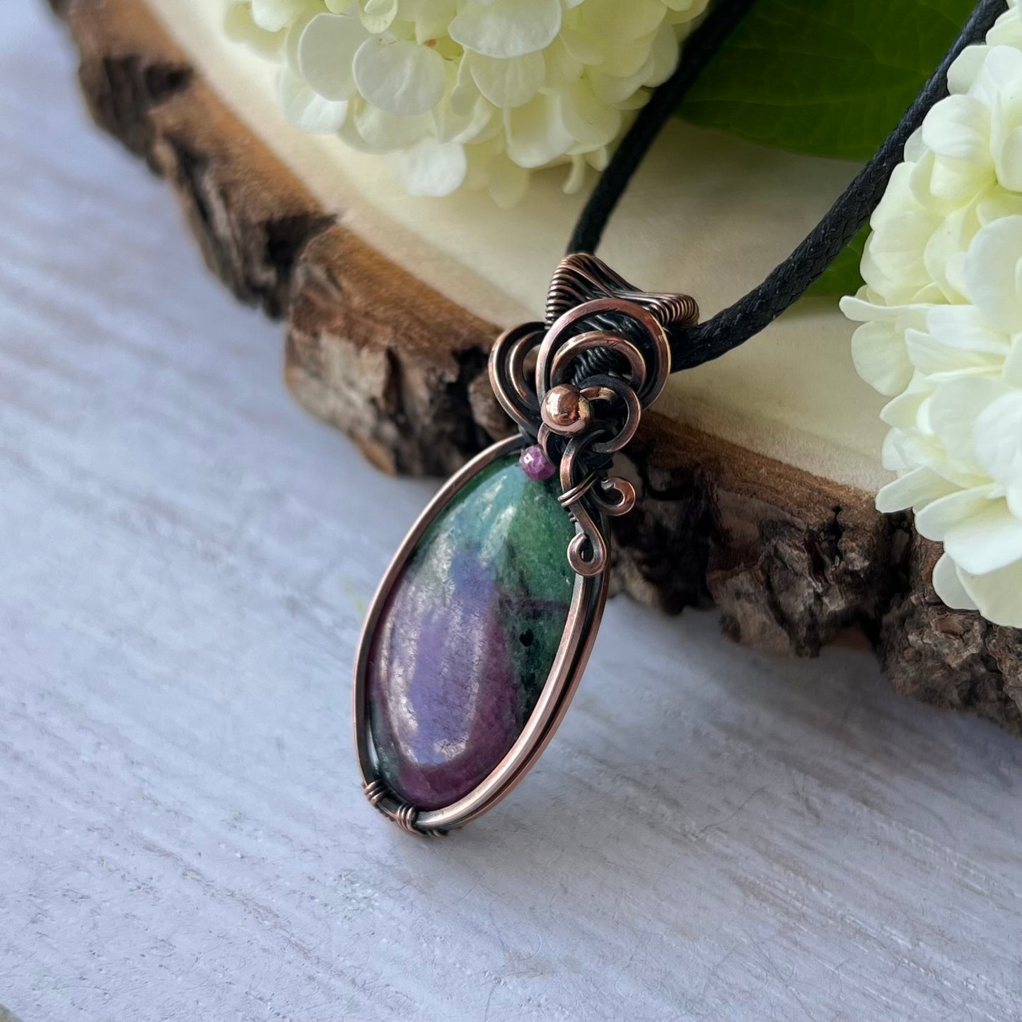 Ruby Zoisite with Ruby bead in antiqued Copper Wire