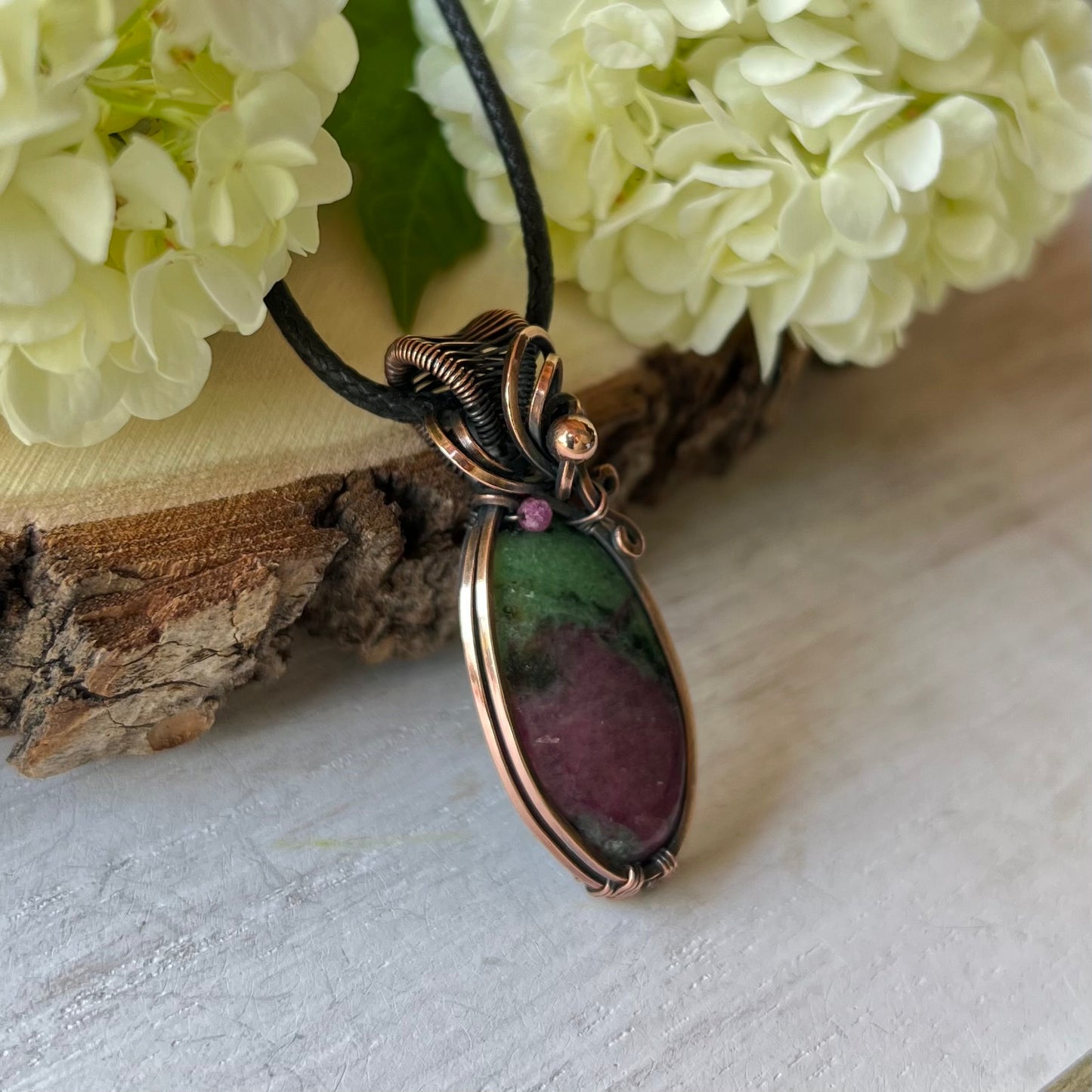 Ruby Zoisite with Ruby bead in antiqued Copper Wire