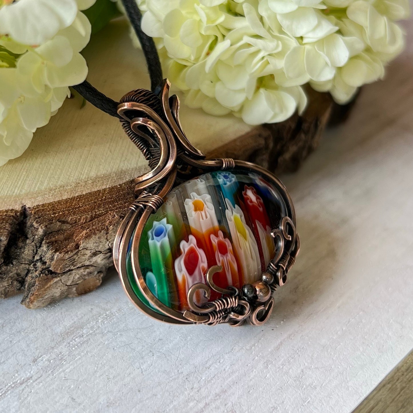 Millefiori Glass Pendant in antiqued Copper Wire