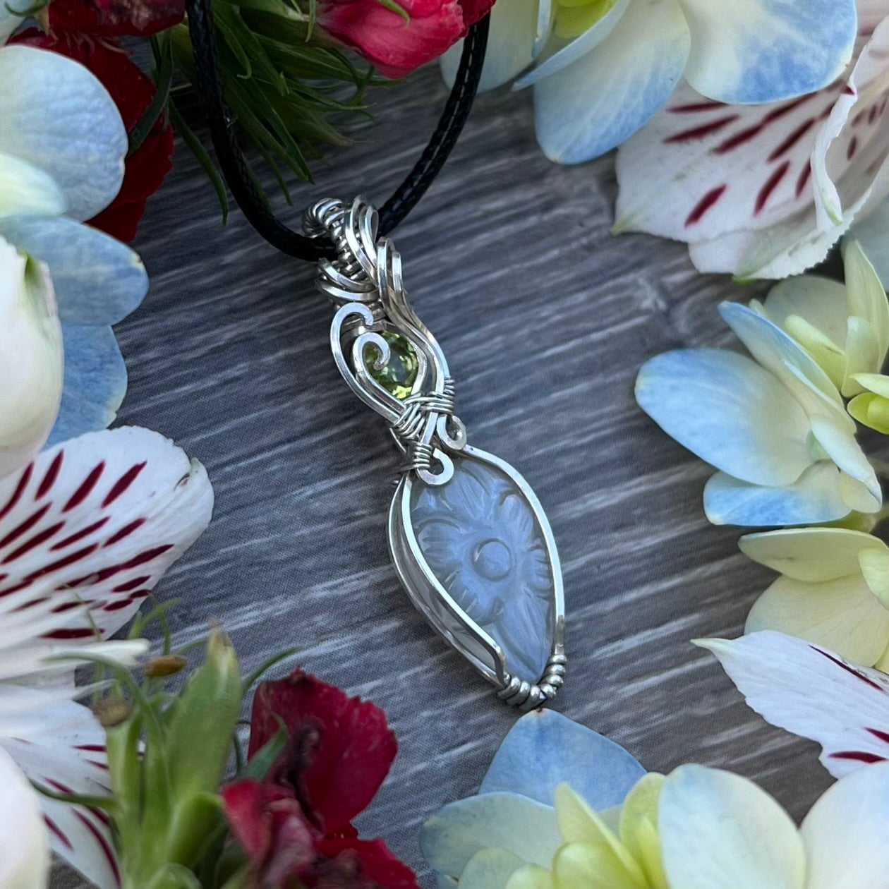 Carved White Moonstone with Peridot Pendant in Argentium Silver