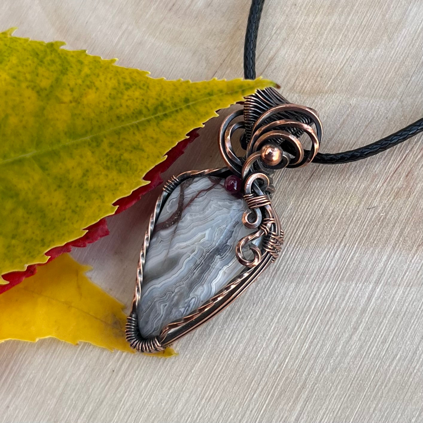 Laguna Lace Agate with Garnet Pendant in Copper