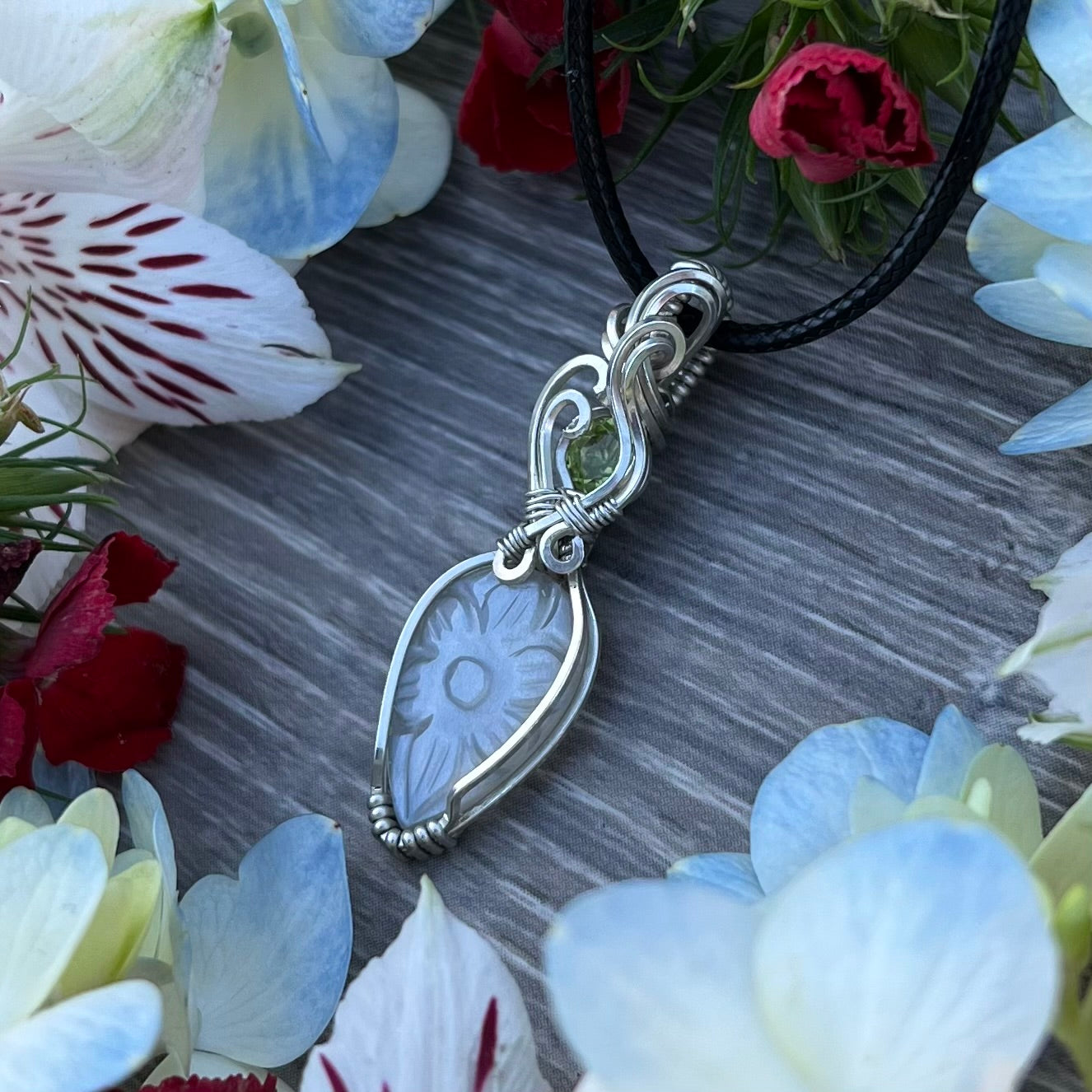 Carved White Moonstone with Peridot Pendant in Argentium Silver